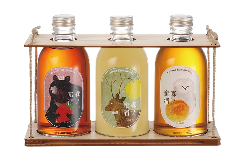 水果蜜酒插画包装设计-孔雀之舞法国酒类创意包装设计